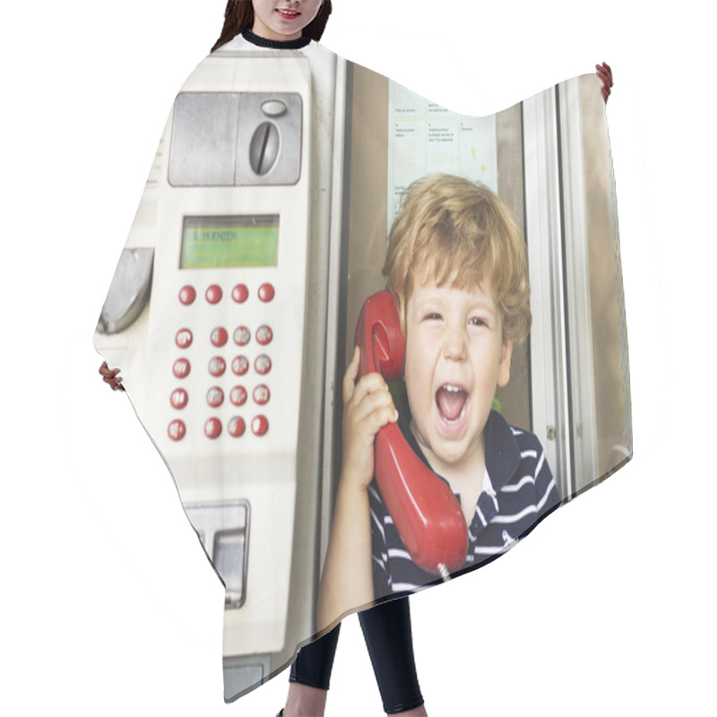 Personality  A Little Boy Yelling Into The Phone. Kid Screaming Into The Red Telephone Handset Hair Cutting Cape