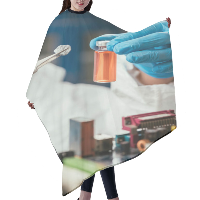 Personality  Cropped View Of Engineer Holding Small Stone With Tweezers And Glass Container With Yellow Liquid Near Computer Motherboard Hair Cutting Cape