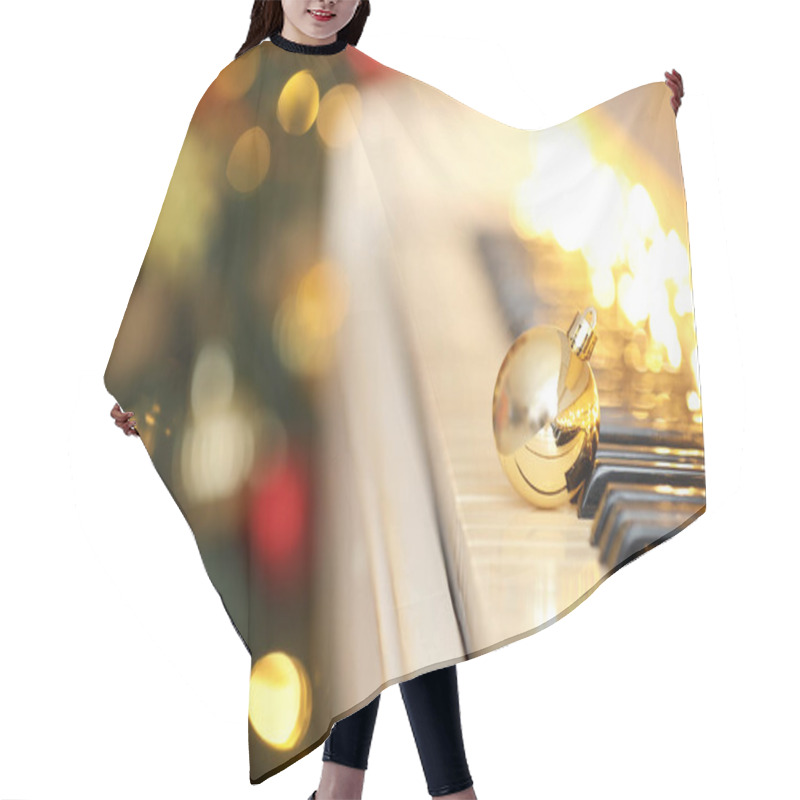 Personality  Beautiful Golden Bauble And Fairy Lights On Piano Keys, Space For Text. Christmas Music Hair Cutting Cape