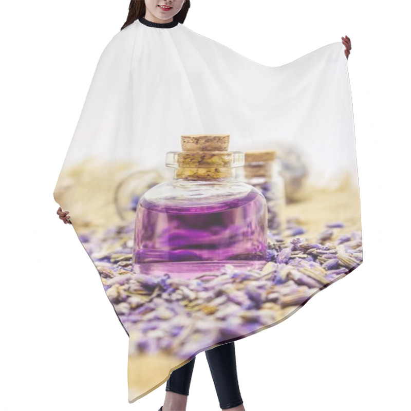 Personality  Essential Oil Of Lavender. Selective Focus. Hair Cutting Cape