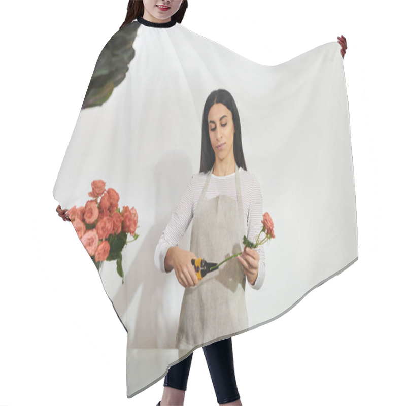 Personality  Beautiful Brunette Florist Skillfully Arranges Roses While Managing Her Small Business. Hair Cutting Cape