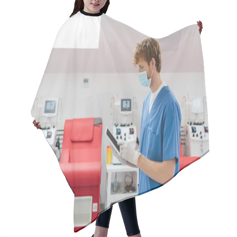 Personality  Redhead Doctor In Medical Mask, Blue Uniform And Latex Gloves Using Digital Tablet With Blank Screen Near Blurred Medical Chairs And Automated Transfusion Machines In Blood Donation Center Hair Cutting Cape