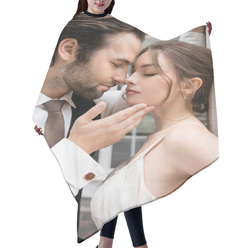 Personality  Portrait Of Groom In Formal Wear Touching Face Of Pretty Bride In Wedding Dress  Hair Cutting Cape