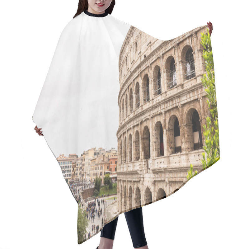 Personality  ROME, ITALY - JUNE 28, 2019: People Walking Near Ruins Of Colosseum And Green Trees Under Grey Sky Hair Cutting Cape