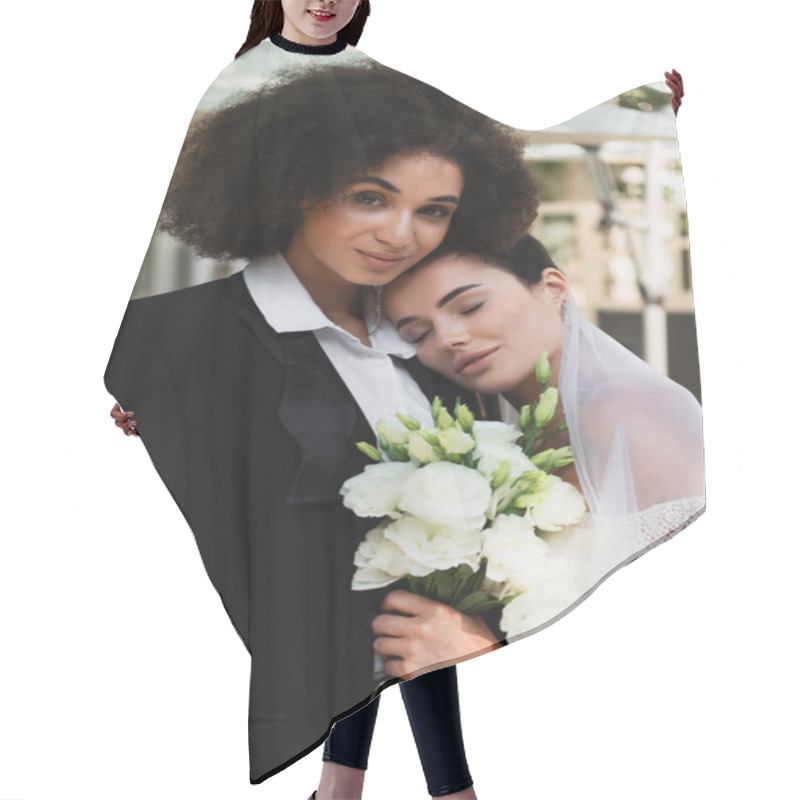 Personality  Young Lesbian Woman In Veil Holding Bouquet Near African American Girlfriend In Suit  Hair Cutting Cape