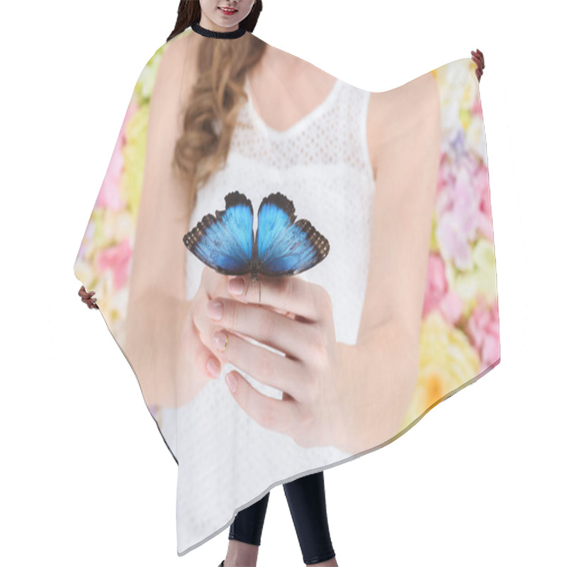 Personality  Cropped Shot Of Woman Holding Beautiful Blue Butterfly Hair Cutting Cape