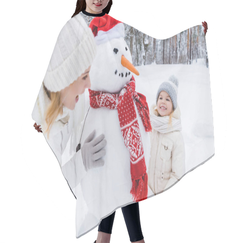 Personality  Happy Mother And Daughter Playing With Snowman In Winter Park Hair Cutting Cape