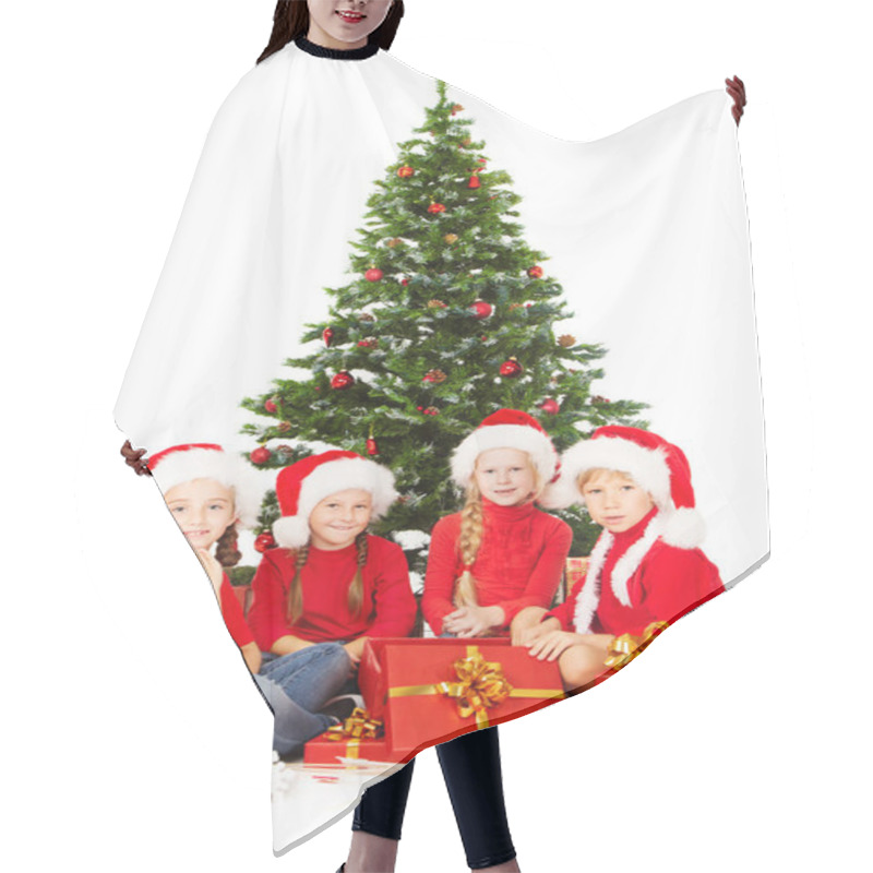 Personality  Christmas Kids In Santa Hat With Presents Sitting Under Fir Tre Hair Cutting Cape