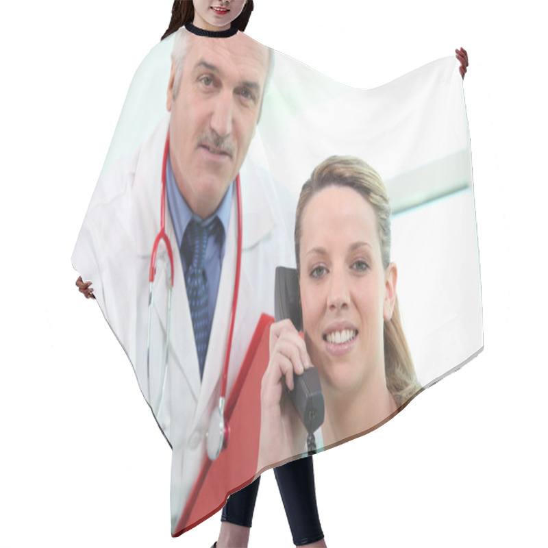 Personality  Doctor Posing With His Assistant Hair Cutting Cape