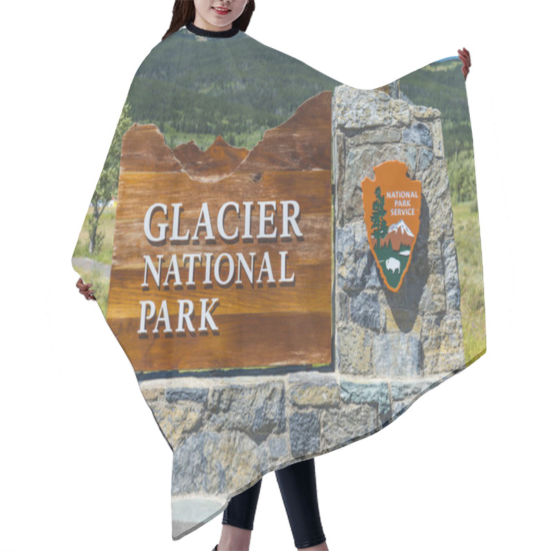 Personality  Glacier National Park,montana,usa. 7-22-17: Glacier National Park Sign In The Entrance. Hair Cutting Cape