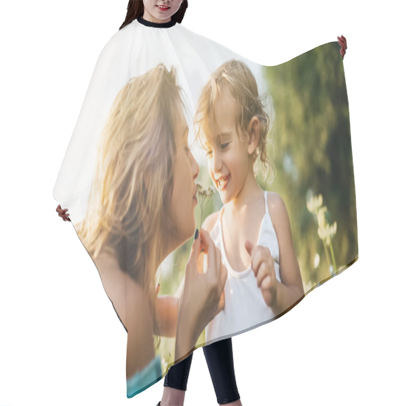 Personality  Mother Sniffing Field Flowers Near Daughter Hair Cutting Cape