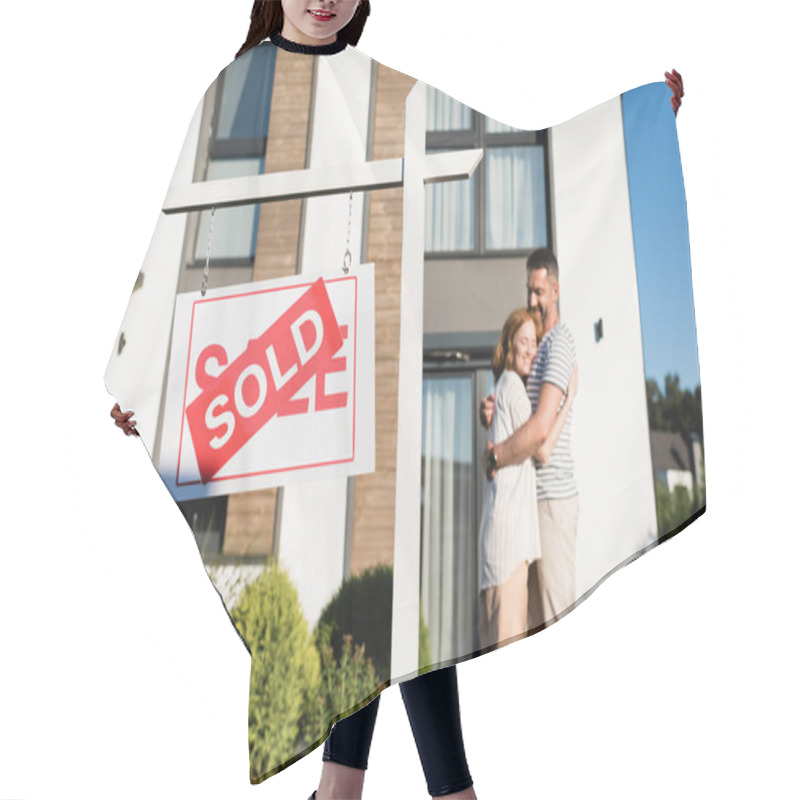 Personality  Sign With Sold Lettering With Blurred Couple Hugging Near House On Background Hair Cutting Cape