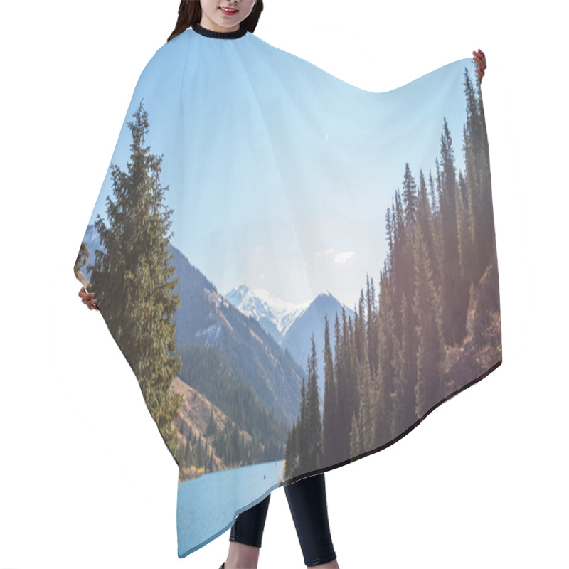 Personality  Crystal-clear Mountain Lake Nestled Among Evergreen Pine Forests With Snow-capped Peaks In The Background, Under A Bright Blue Sky Hair Cutting Cape