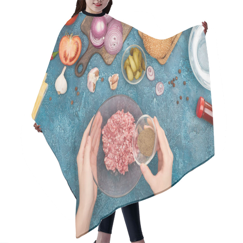 Personality  Top View Of Woman Adding Black Pepper To Minced Meat Near Burger Ingredients On Blue Textured Surface Hair Cutting Cape