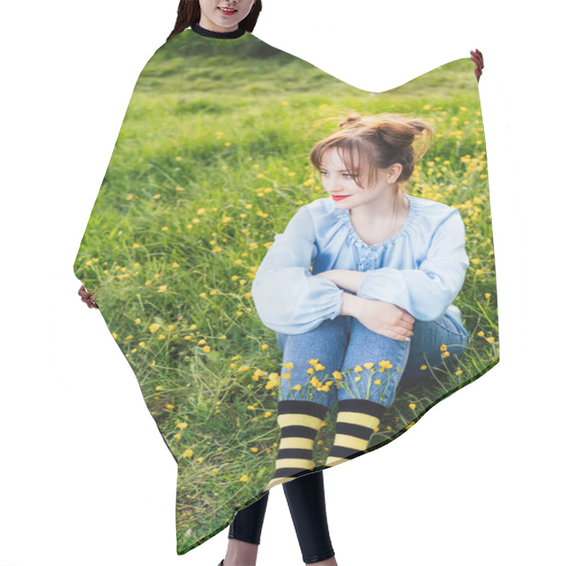 Personality  Young Woman Wearing Blue Blouse, Jeans And Striped Black And Yellow Socks With Flowers Inside Sitting On The Green Grass Of Blooming Meadow. Anime Style. Concept Of Bee Protection, Bloom Season. Hair Cutting Cape