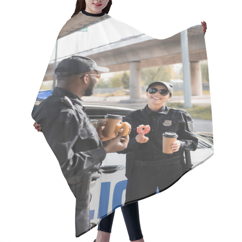 Personality  Multicultural Police Officers With Paper Cups And Doughnuts Talking Near Patrol Car On Blurred Background On Urban Street Hair Cutting Cape