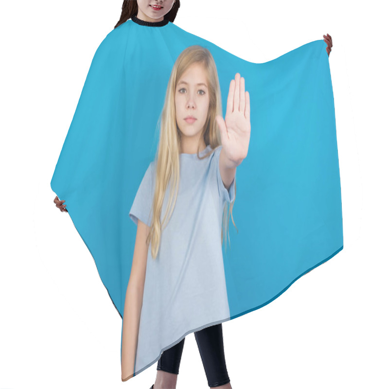 Personality   Beautiful Caucasian Girl Wearing Blue T-shirt  Doing Stop Gesture With Palm Of The Hand. Warning Expression With Negative And Serious Gesture On The Face. Hair Cutting Cape