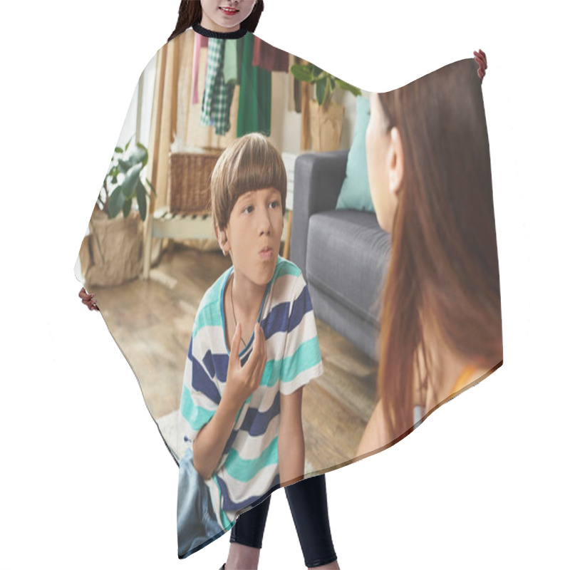 Personality  A Little Boy With Hearing Difficulties Communicates With His Mother In A Warm Environment. Hair Cutting Cape