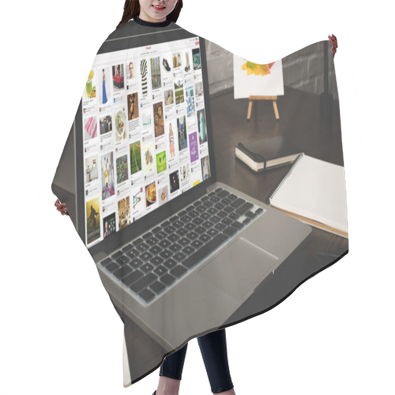 Personality  Designer Workplace With Laptop And Pinterest Website On Screen  Hair Cutting Cape