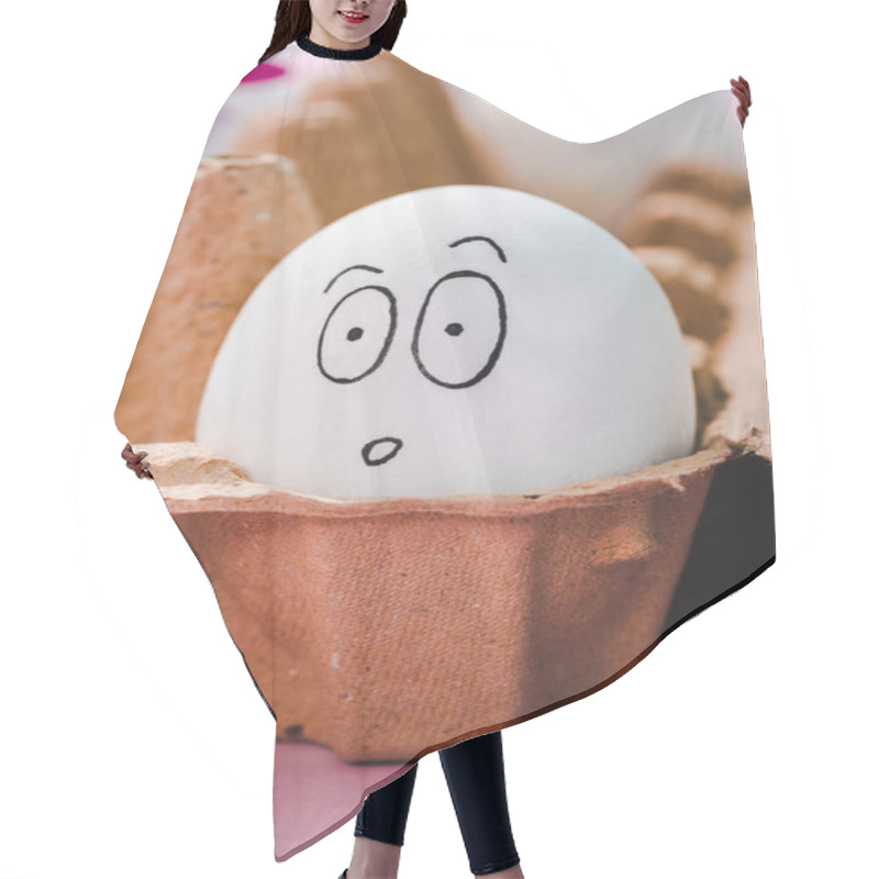 Personality  Selective Focus Of Egg With Surprised Face Expression In Egg Carton Hair Cutting Cape