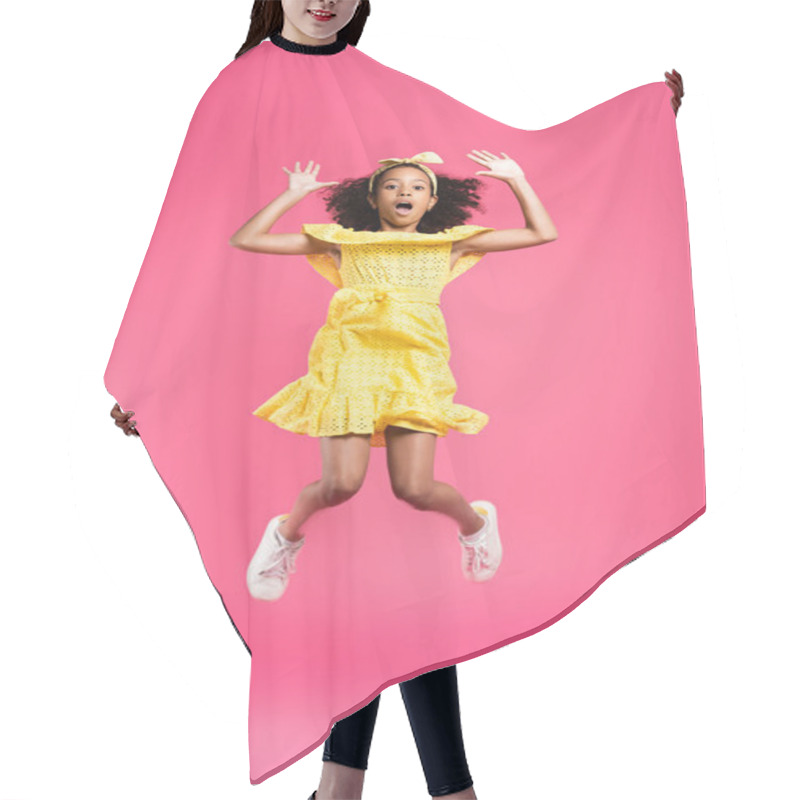 Personality  Full Length View Of Shocked Curly African American Child In Yellow Outfit Jumping On Pink Background Hair Cutting Cape