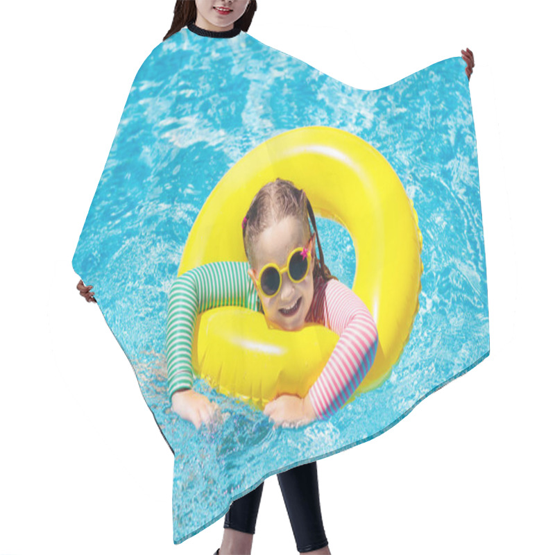 Personality  Child With Sunglasses In Swimming Pool. Little Girl On Inflatable Ring. Kid With Colorful Float. Kids Learn To Swim And Dive In Outdoor Pool Of Tropical Resort. Sun Protection And Eye Wear. Water Fun. Hair Cutting Cape