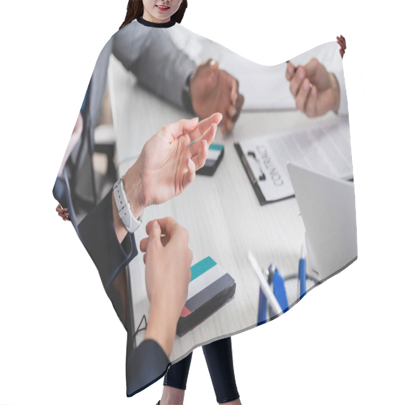 Personality  Cropped View Of Arabian Businesswoman Pointing With Hand Near Multicultural Business Partners And Digital Translators, Blurred Background Hair Cutting Cape