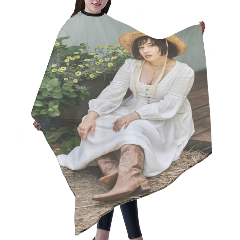 Personality  A Young Woman In A White Dress And Straw Hat Sits In A Summer Garden, Surrounded By Greenery. Hair Cutting Cape