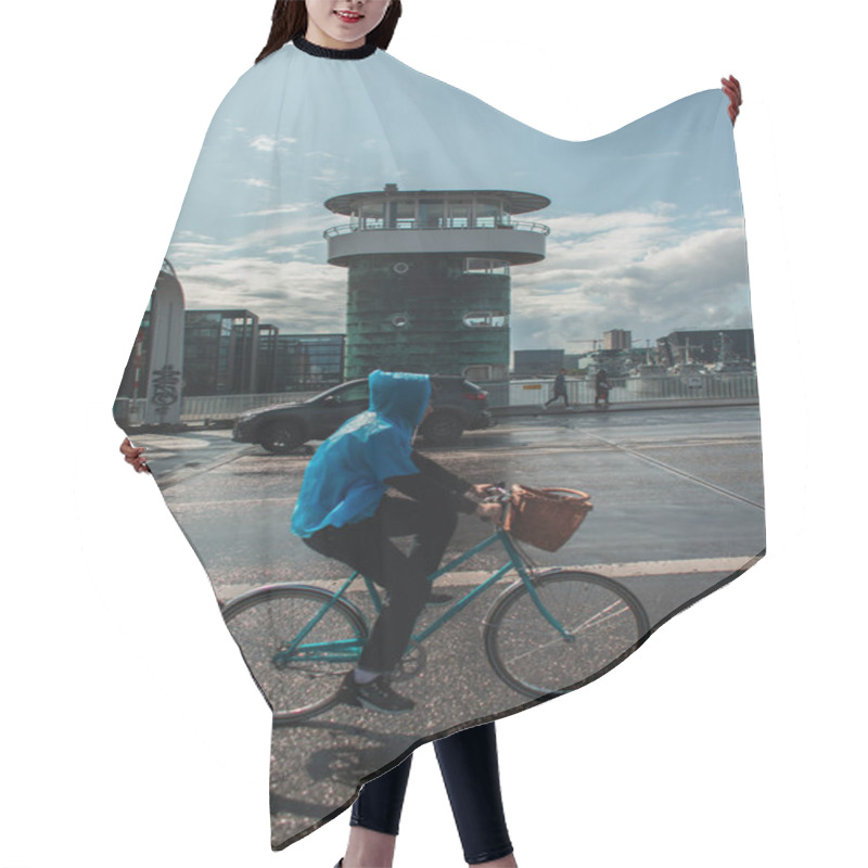 Personality  COPENHAGEN, DENMARK - APRIL 30, 2020: Side View Of Woman Cycling On Urban Street After Rain  Hair Cutting Cape