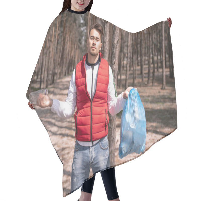 Personality  Young Man Holding Blue Trash Bag And Plastic Bottle In Forest  Hair Cutting Cape