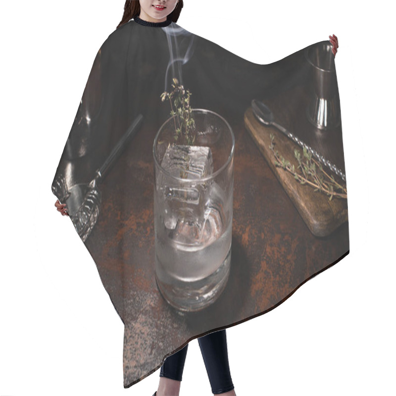 Personality  Transparent Glass With Burning Herb, Ice Cube And Vodka On Weathered Surface Hair Cutting Cape