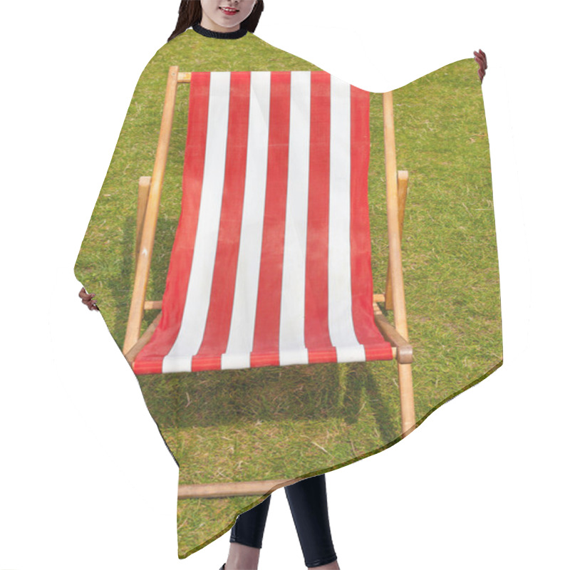 Personality  Canvas Deckchair On A Grassy Lawn In The Summer. Hair Cutting Cape