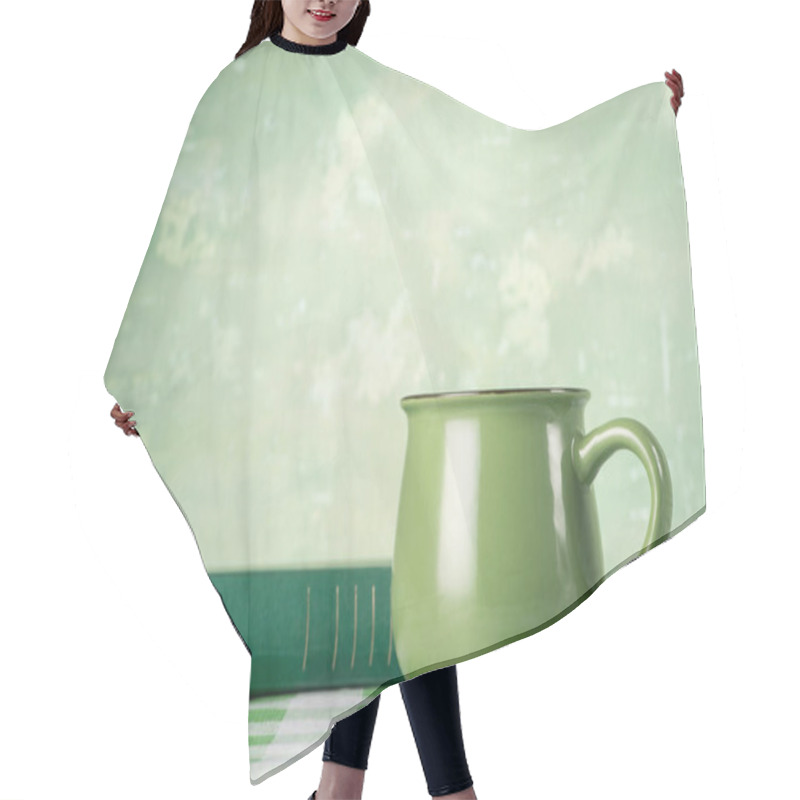 Personality  Green Book And Mug On Table Hair Cutting Cape