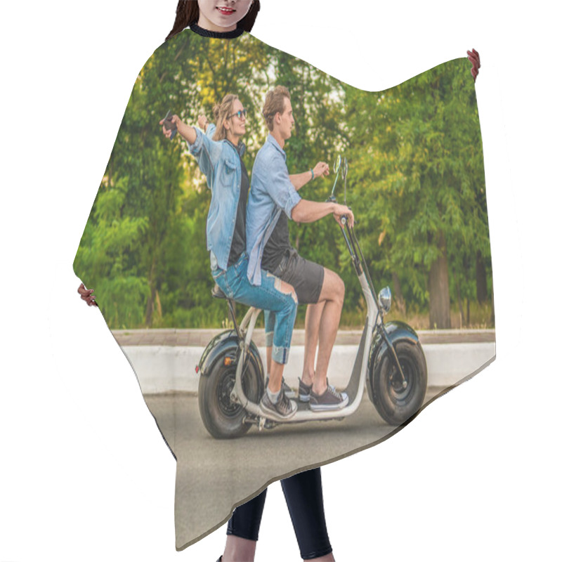 Personality  Lovely Young Couple Driving Electric Bike During Summer Hair Cutting Cape