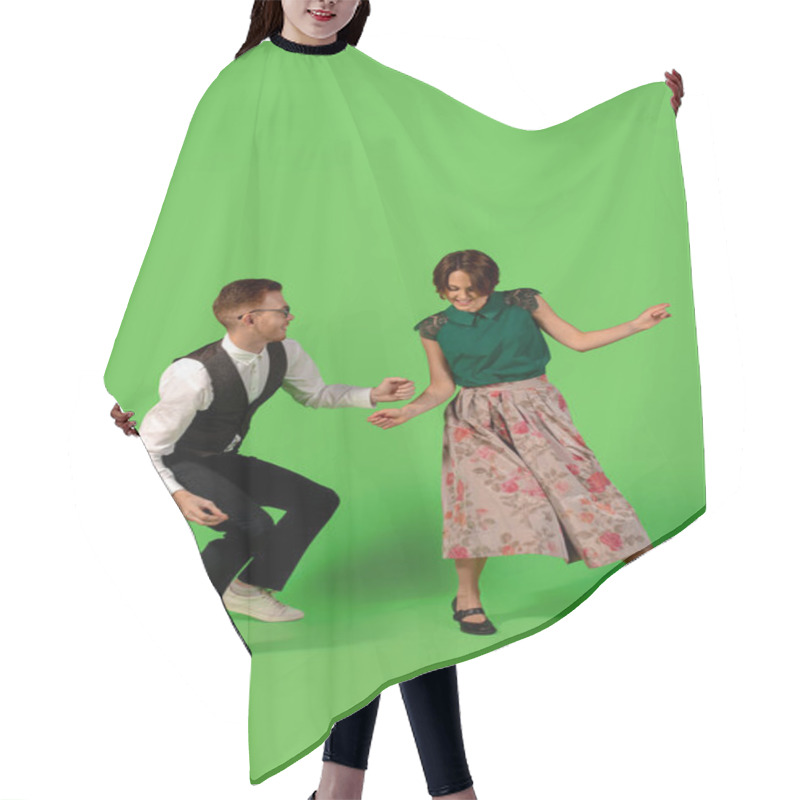 Personality  Old-school Fashioned Young Woman Dancing Isolated On Green Background Hair Cutting Cape