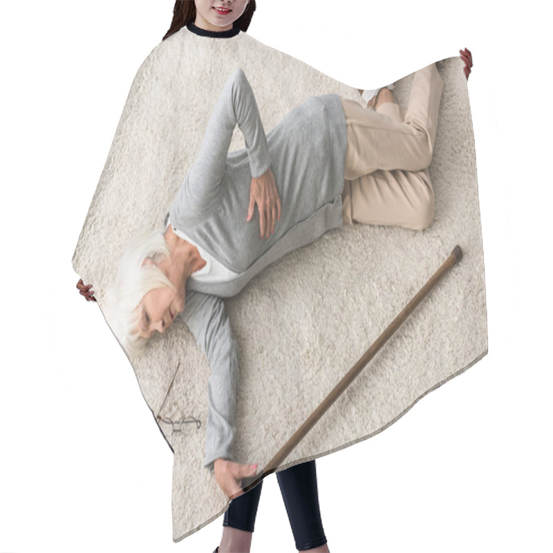 Personality  Overhead View Of Sick Senior Woman With Walking Stick Lying On Carpet Hair Cutting Cape