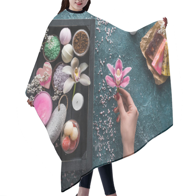 Personality  Partial Top View Of Person Holding Orchid Flower And Organic Spa Accessories In Box  Hair Cutting Cape