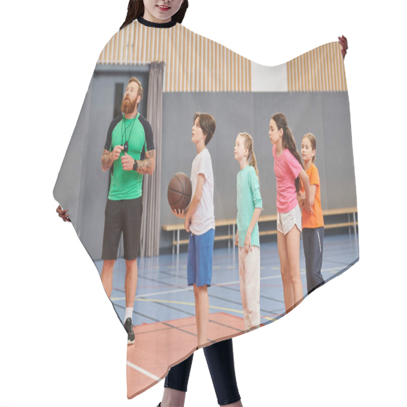 Personality  A Man Stands Before A Group Of Kids, Holding A Basketball And Providing Guidance In A Vibrant, Engaged Classroom Setting. Hair Cutting Cape