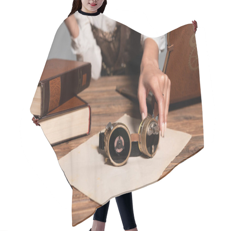 Personality  Cropped View Of Woman Holding Steampunk Goggles At Workplace Hair Cutting Cape