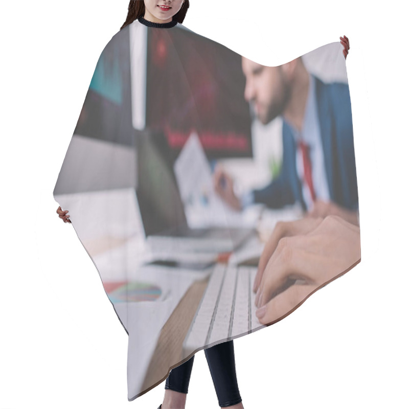 Personality  Selective Focus Of Data Analyst Typing On Computer Keyboard Near Colleague At Table  Hair Cutting Cape