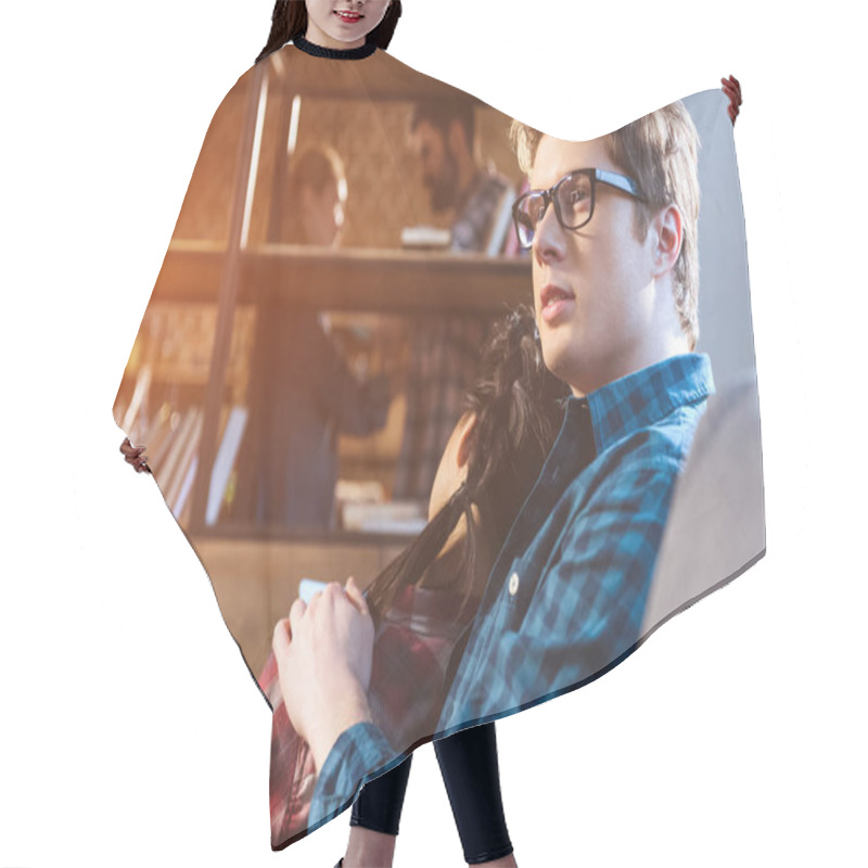 Personality  Couple Resting On Couch Hair Cutting Cape