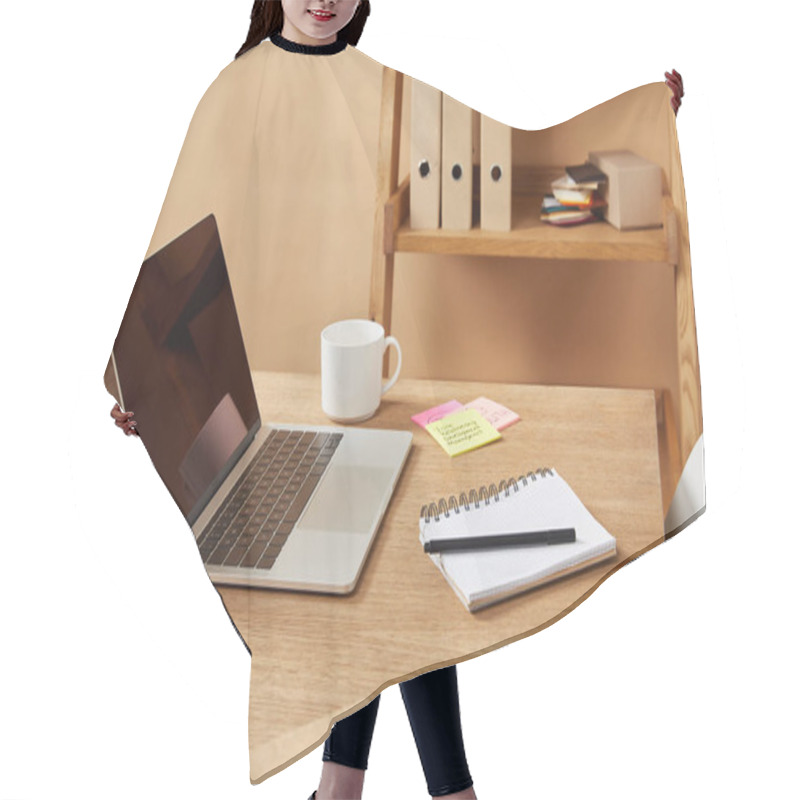 Personality  Laptop, Notebooks And Pencils On Wooden Table At Home Hair Cutting Cape