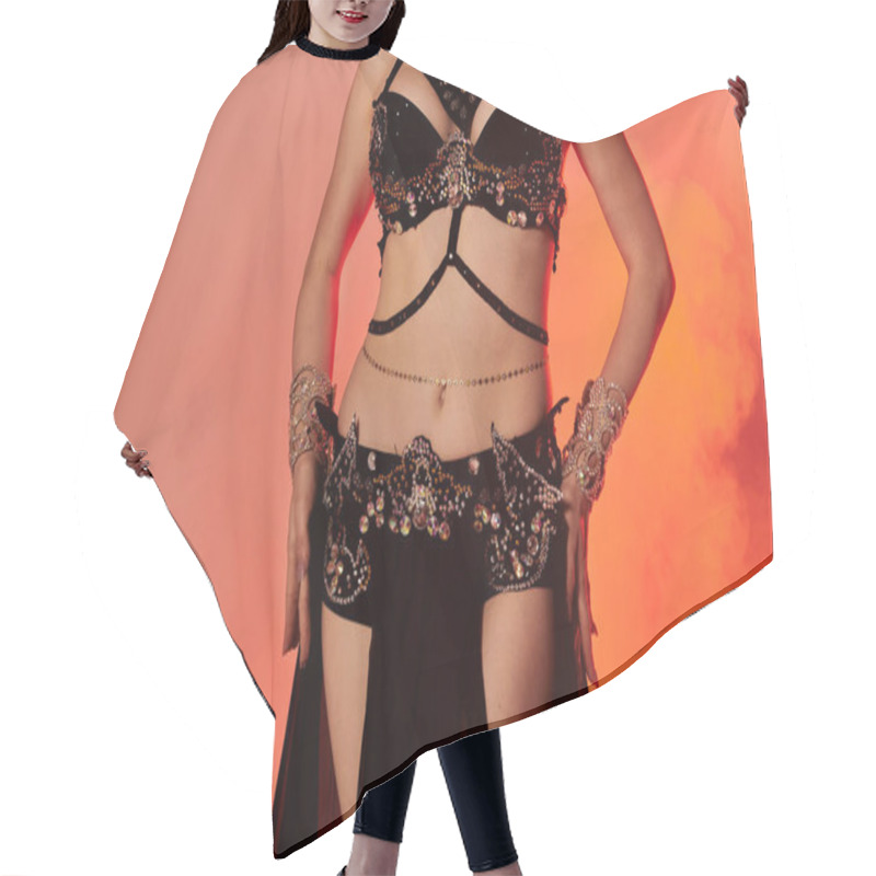 Personality  Captivating Woman In Belly Dance Attire Elegantly Strikes A Pose. Hair Cutting Cape