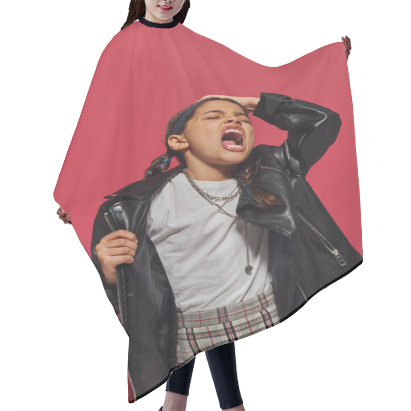 Personality  Angry And Fashionable Preteen Girl With Hairstyle Screaming And Touching Head While Posing In Leather Jacket And Standing Isolated On Red, Hairstyle And Trendy Accessories Concept Hair Cutting Cape