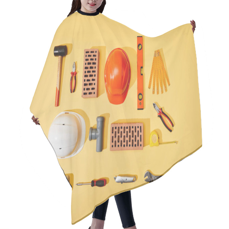 Personality  Top View Of Bricks, Helmets, Measuring Tape, And Industrial Tools On Yellow Background Hair Cutting Cape