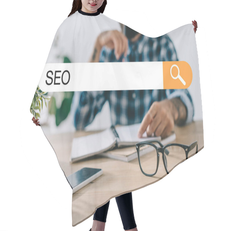 Personality  Cropped Shot Of Developer In Plaid Shirt With SEO Search Bar Hair Cutting Cape