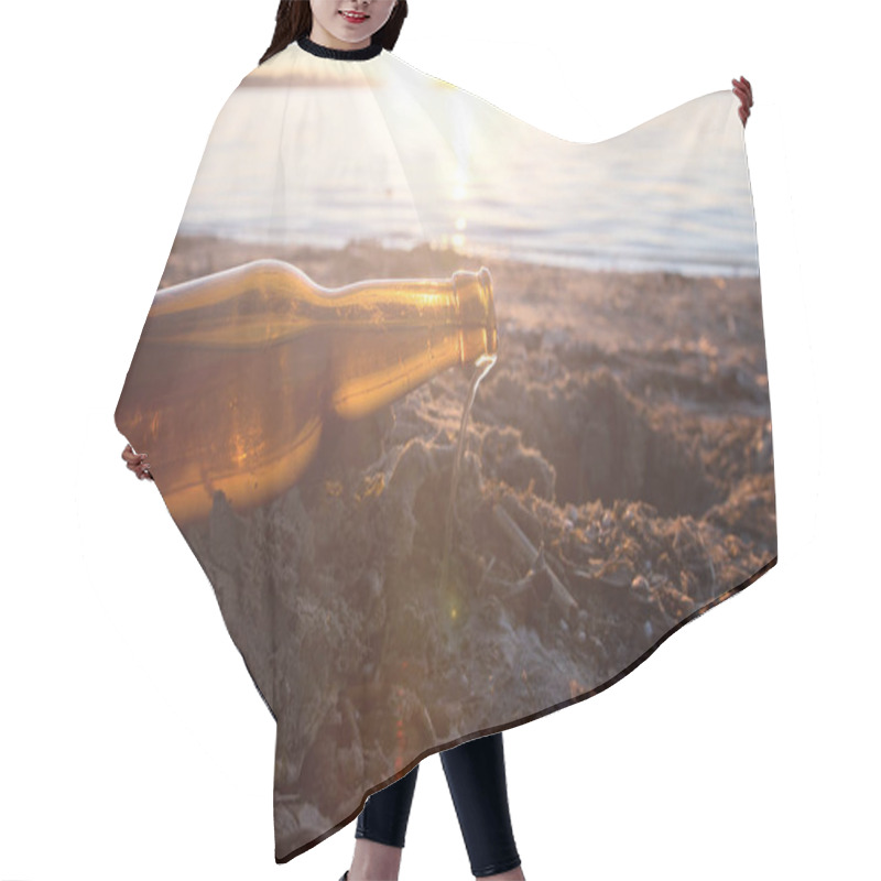 Personality  Glass Bottle Littering A Sandy Lakeshore At Sunset, Symbolizing Environmental Pollution And The Need For Cleanup Efforts. Ideal For Raising Awareness On Waste Management And Ecological Protection. Hair Cutting Cape