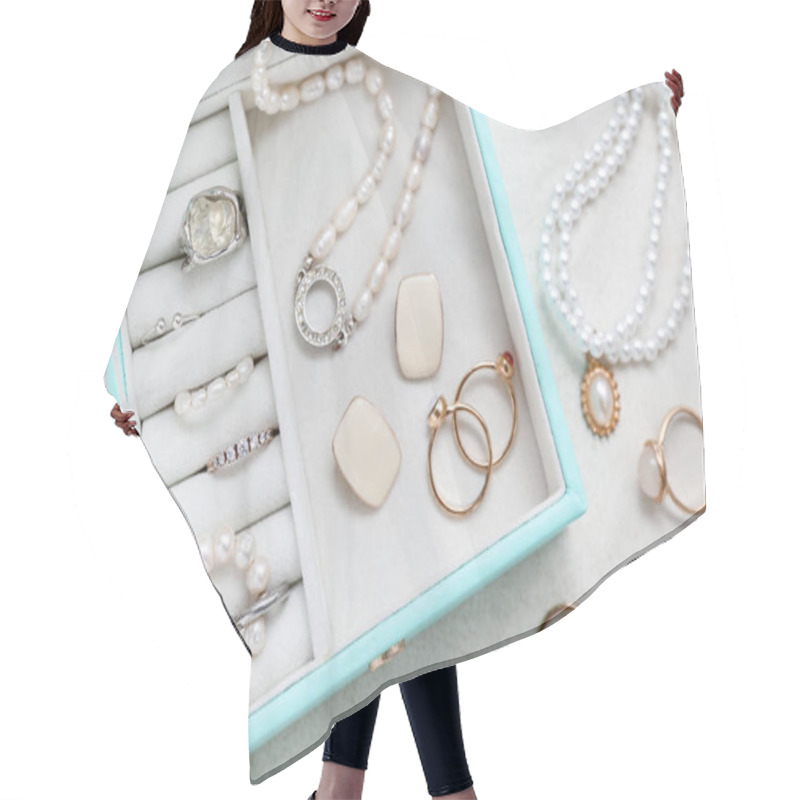 Personality  Organizer And Stylish Jewelry On White Background Hair Cutting Cape