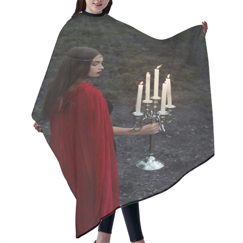 Personality  Elegant Girl In Red Cloak Holding Candelabrum With Candles And Walking In Forest Hair Cutting Cape