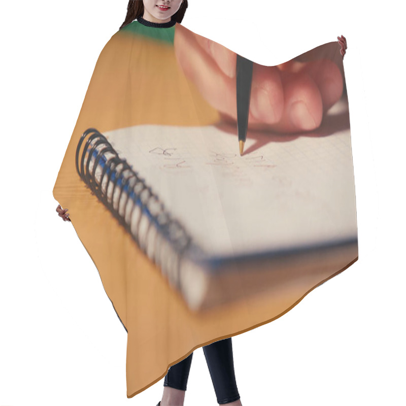 Personality  Close Up View Of Man Holding Pen And Writing On Notepad Hair Cutting Cape